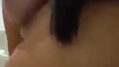 Tamil porn of a girl riding after putting a condom on a dick