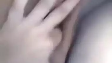 Horny Desi gal displays saggy tits and also fingers her XXX cunny