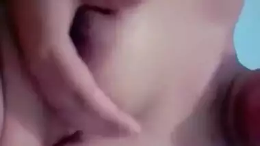 Pretty Indian belle records solo porn clip in which she poses naked