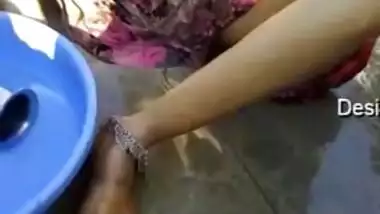 Indian woman is washing boobs while XXX partner is filming her