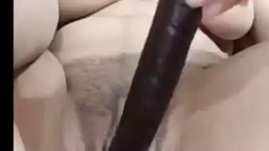 Beautiful girl with dildo masturbating her pussy