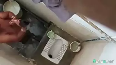 XXX clip of village aunty taking bath in outdoor taken on her son