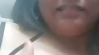 Desi bhabi self boobs press and licking boobs and her own finger selfie clip for lover