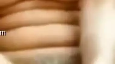 Desi whore strips and actively XXX drills her twat with long dildo