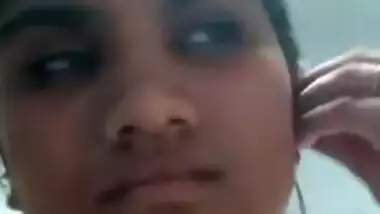 Busty Desi girl pulls T-shirt up exposing her XXX boobies and sex opening