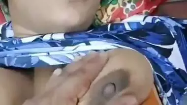 Squeezing a Tamil milf’s milky boobs