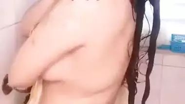 Model wet tease in bathroom video