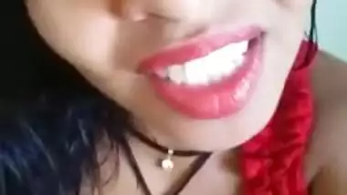 Desi chick in a red dress performs a sex show with XXX tits and vagina