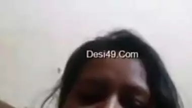Desi mom simply sits in front of camera and talks with serious face