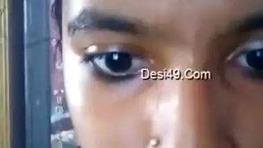 Indian teen with big eyes and pierced nostril shows what she has got