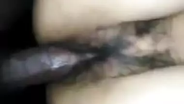 Desi girl has XXX tool of man behind the camera in her hairy pussy