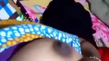 Pretty Desi MILF poses for the camera and teases with big XXX tits