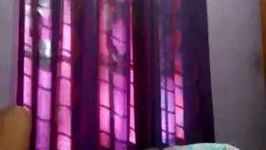 Tempting Indian woman sets camera to film XXX breasts during sex posing